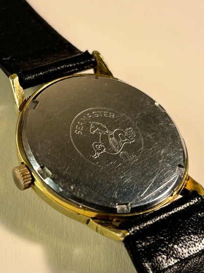 Omega Genève Ref. 601 gold plated 1968 men’s vintage dress timekeeper caseback view with hallmark details