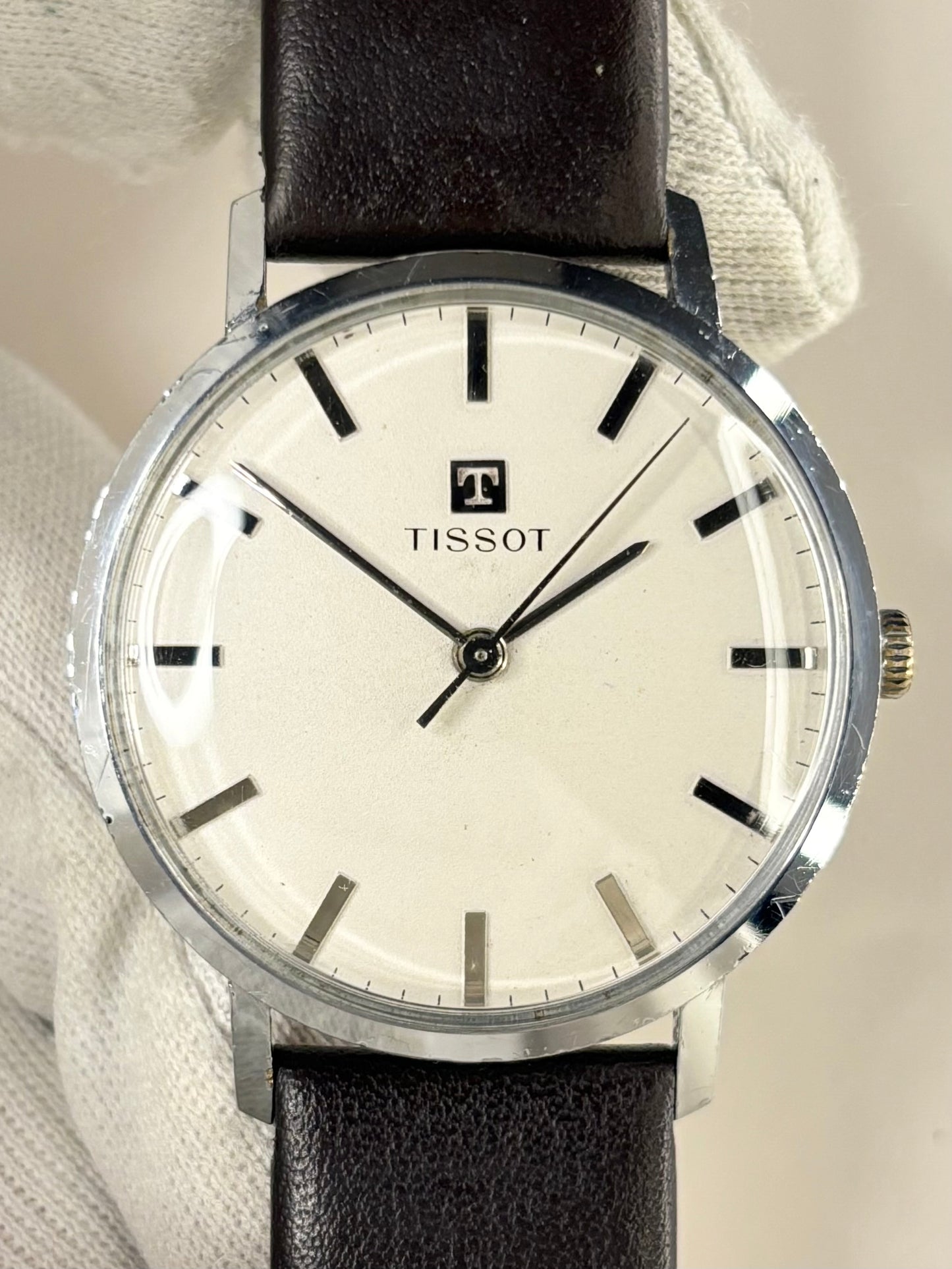 1960s Tissot vintage dress watch with stainless steel case and classic dial, a timeless Swiss manual timepiece and refined mechanical timekeeper.