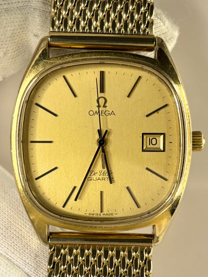 Close-up of Omega quartz movement watch ref. 192.0034, gold-toned dial, gold-plated case