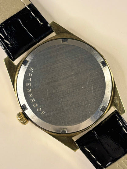 Omega Genève Ref. 135.041 gold plated 1969 men’s dress timekeeper caseback view with hallmark details