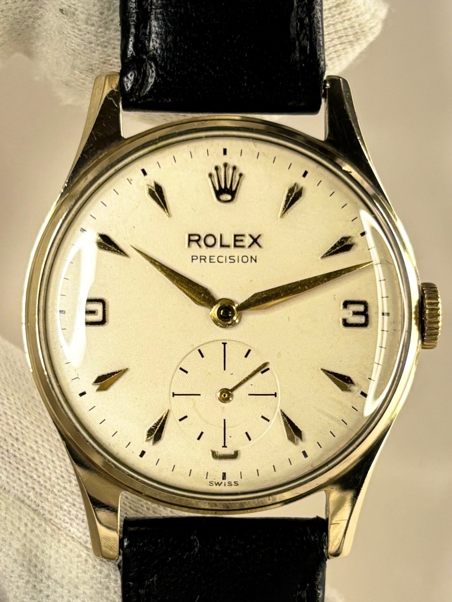 1950s Rolex dress watch ref. 12868 with classic dial and 9ct solid gold case, a timeless Swiss vintage timepiece and refined mechanical timekeeper.