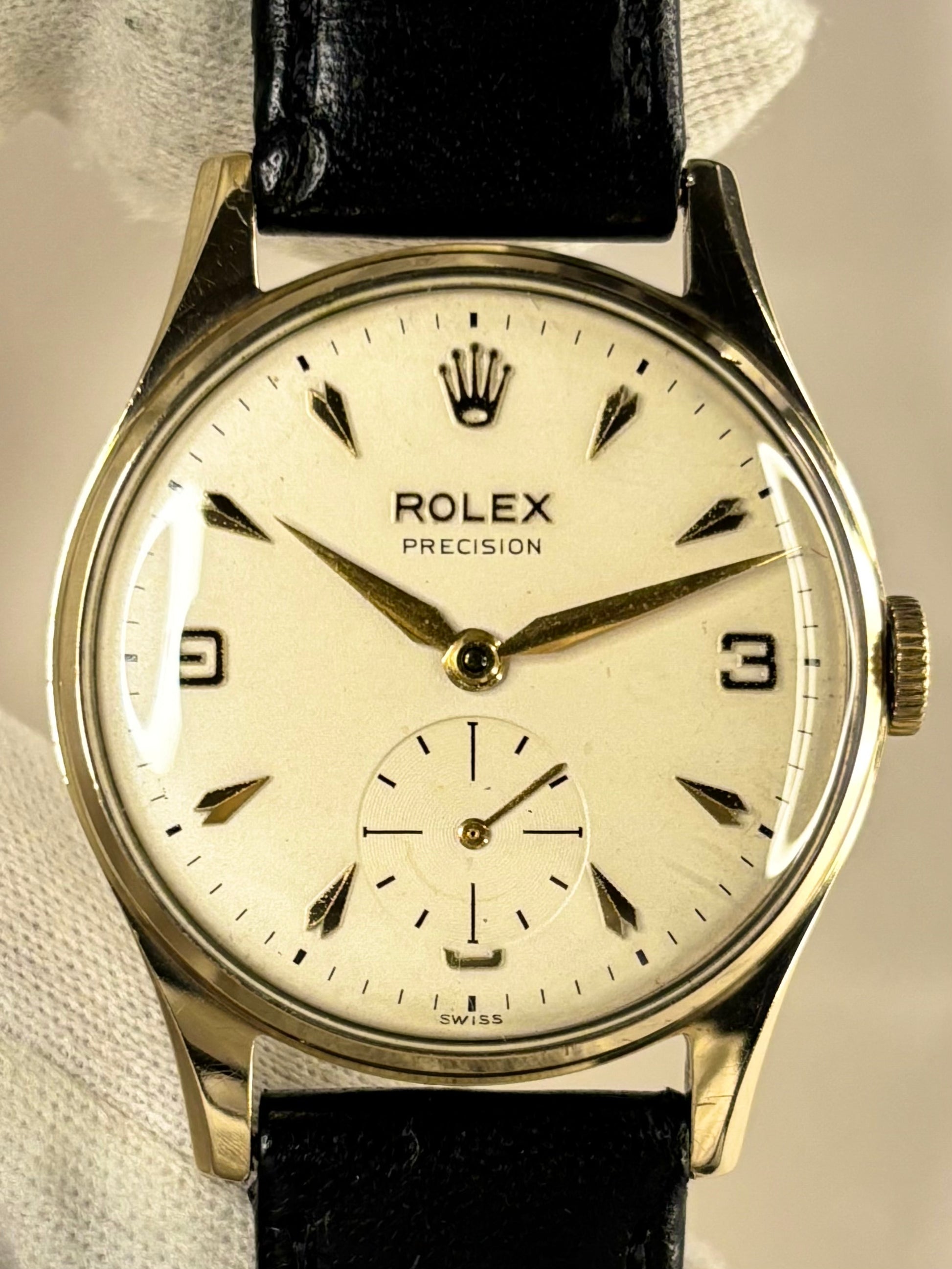 1950s Rolex dress watch ref. 12868 with classic dial and 9ct solid gold case, a timeless Swiss vintage timepiece and refined mechanical timekeeper.