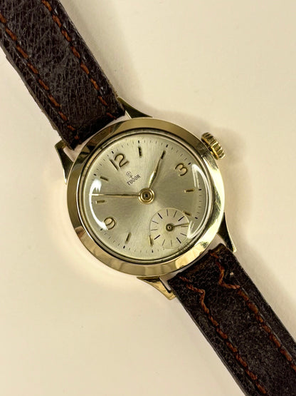 Tudor 1957 ladies vintage timekeeper with 9ct gold case, white sunburst dial and manual movement