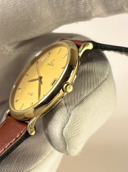 Side profile of Omega De Ville 1989 vintage men’s dress timekeeper quartz watch signed omega crown 