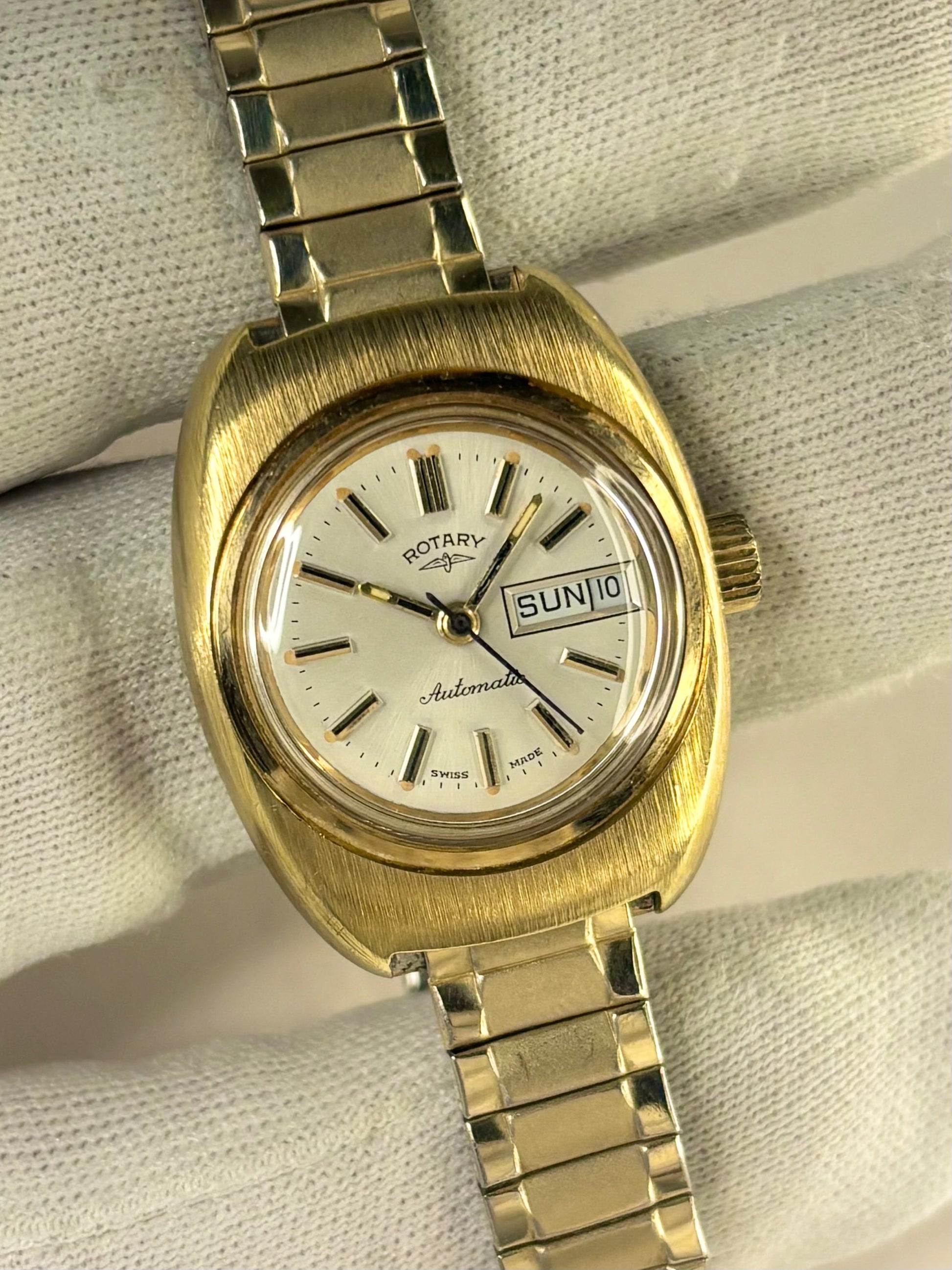 Vintage c.1977 Rotary automatic timepiece – ladies' gold-plated dress watch with white sunburst dial, in good condition with only minor age-appropriate marks