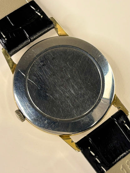 Tissot Ref. 41014 gold plated 1963 men’s vintage dress timekeeper caseback view with hallmark details