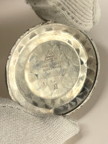 Omega Ref. 161.009 stainless steel 1965 men’s dress timekeeper caseback view with hallmark details