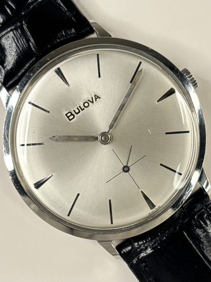 Vintage 1960s Bulova men’s dress watch stainless steel case white dial