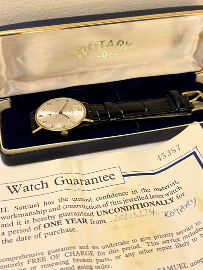 Close-up of the Rotary c.1974 timepiece showcasing its radiant white sunburst dial and polished gold-plated case, presented as an elegant manual timekeeper
