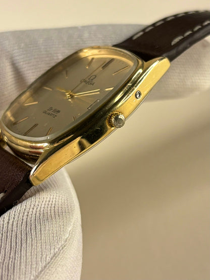 Side profile of Omega De Ville 1979 vintage men’s dress timekeeper quartz watch, omega signed crown 
