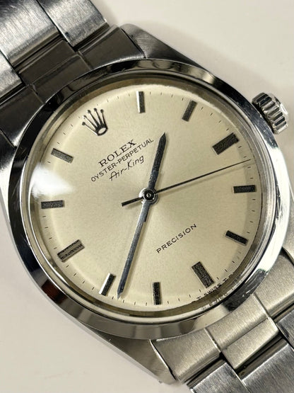 Close-up of Rolex Oyster-Perpetual vintage automatic watch with white dial, ref. 5500, stainless steel case