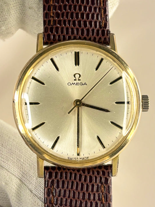 Vintage Omega ref. 131.019 manual timepiece – c.1965 men's gold-plated dress watch with white sunburst dial, in good condition with only minor age-appropriate marks