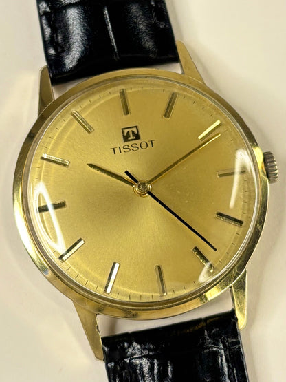 Collectible Tissot Ref. 41014 men’s vintage timekeeper featuring gold toned dial and classic Swiss craftsmanship