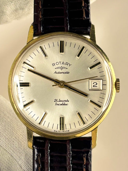 Vintage c.1973 Rotary automatic timekeeper – men's gold-plated dress watch with white sunburst dial, in good condition with only minor age-appropriate marks.
