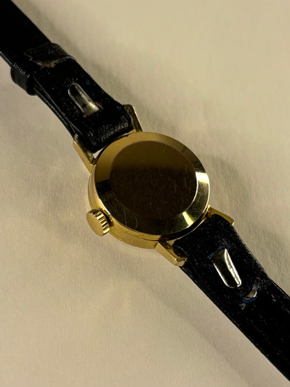 Omega ladies Ref. 511.073 vintage 1963 gold plated timekeeper caseback view with hallmark details