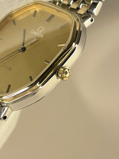 Side profile of Omega De Ville 1982 vintage men’s dress timekeeper quartz
 signed omega crown 