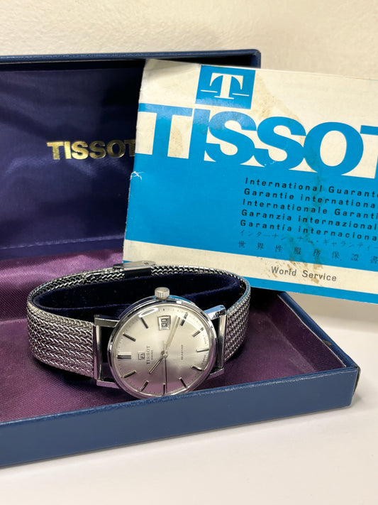 Vintage Tissot Seastar watch – c.1977 men's stainless steel manual dress watch with white sunburst dial, in good condition with minor age-appropriate marks, complete with original box and papers.
