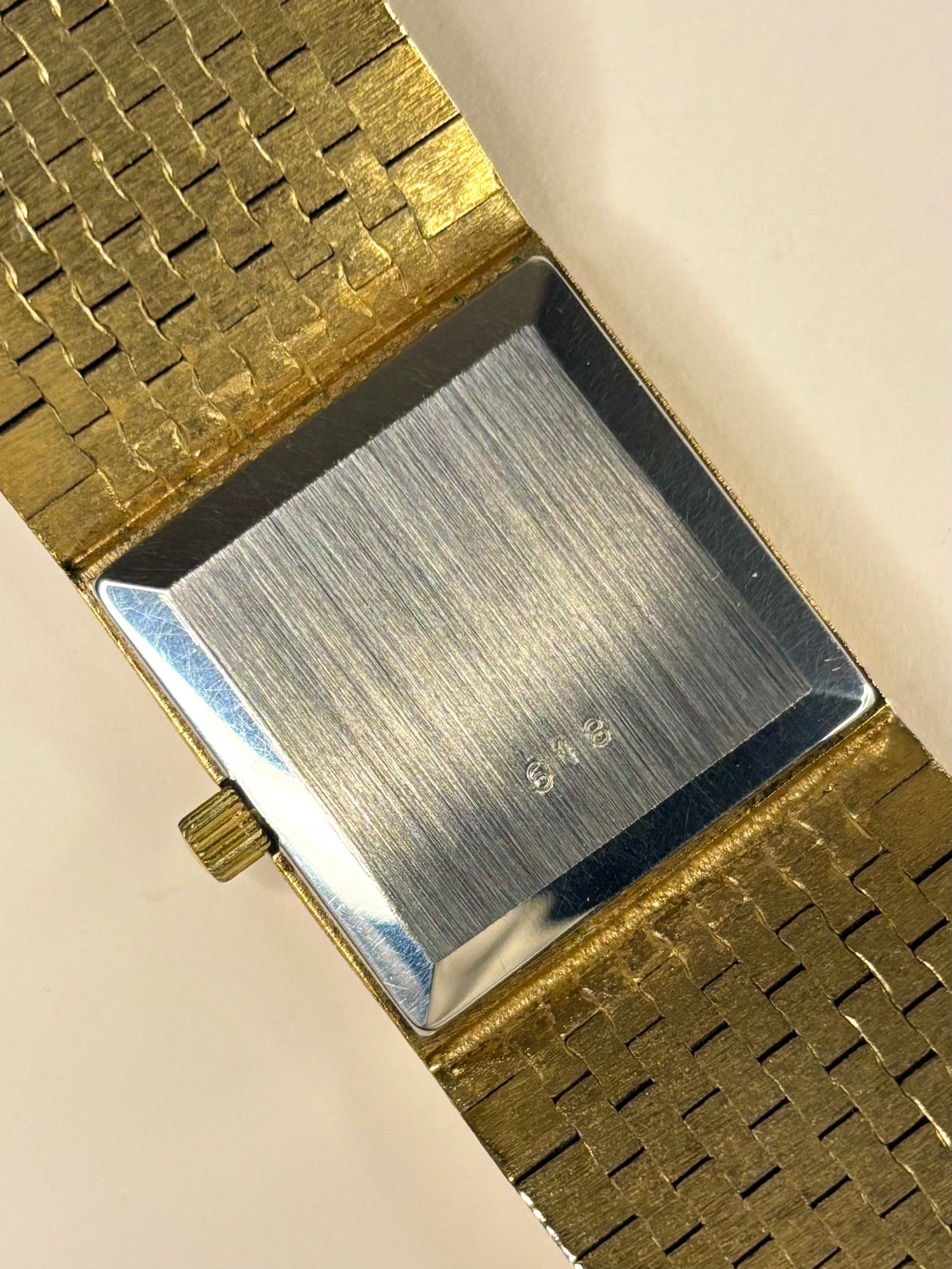 Macro shot of the Rotary manual-wind timepiece highlighting the caseback