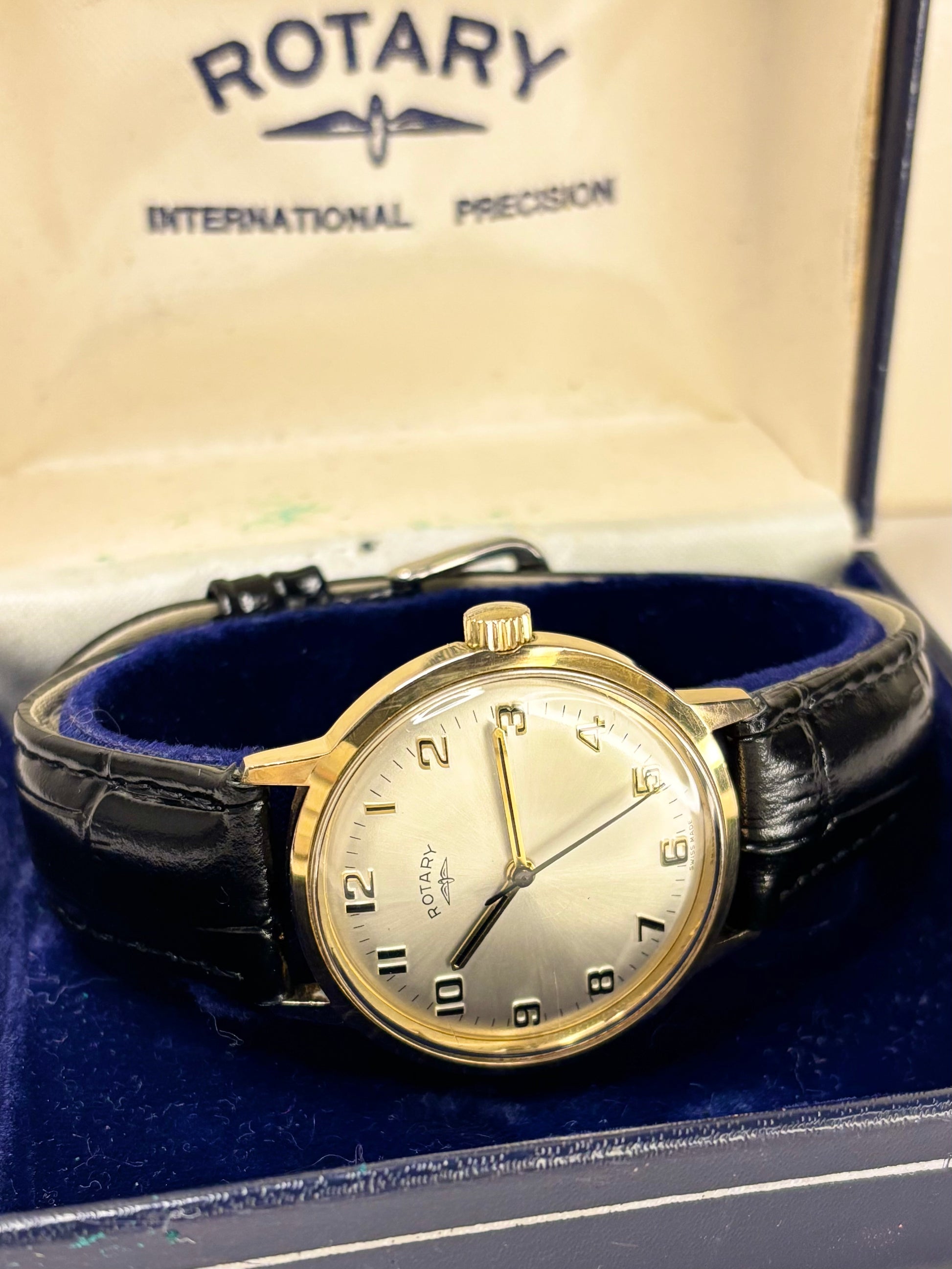 Luxury vintage Rotary automatic dress watch featuring a gold-plated case and white sunburst dial, a finely handmade timepiece and precise timekeeper