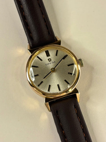 Collectible Omega ladies Ref. 620 1966 vintage timekeeper featuring white sunburst dial and refined styling