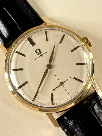 Classic 1960s Omega 18ct gold manual dress watch sub-seconds dial 121.014