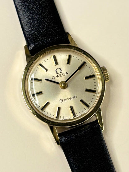 Collectible Omega Genève ladies Ref. 511.0451 timekeeper featuring white sunburst dial and gold finish