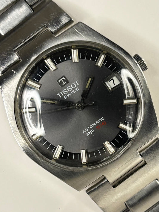 Vintage Tissot PR516 Ref. 44630-2X men’s stainless steel timekeeper showcasing sporty 1970s Swiss design with original box