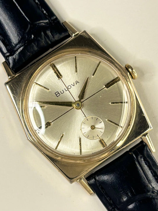 Vintage Bulova watch – c.1966 men's gold-plated manual dress watch with white sunburst dial, in good condition with age-appropriate marks.
