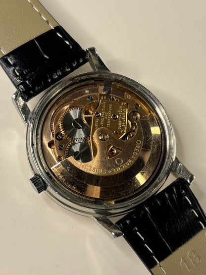 automatic mechanism movement of Omega Constellation 1960s Ref. 168.018 automatic stainless steel watch
