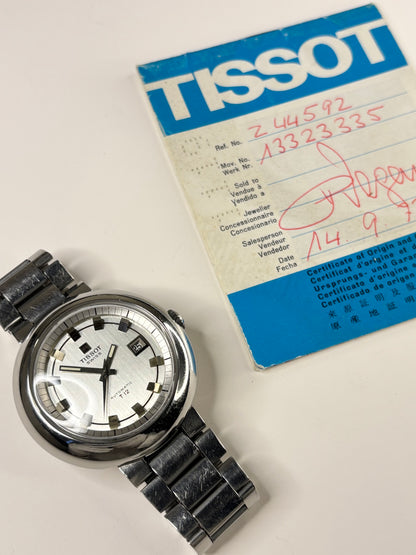 Collectible Tissot Ref. 44592 men’s vintage 1973 timekeeper featuring silver toned dial, UFO case and original papers