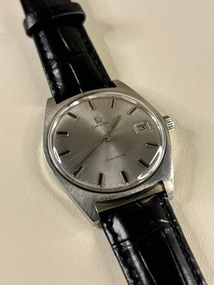 Collectible Omega Genève Ref. 136.041 1968 timekeeper featuring silver sunburst dial and vintage Swiss charm