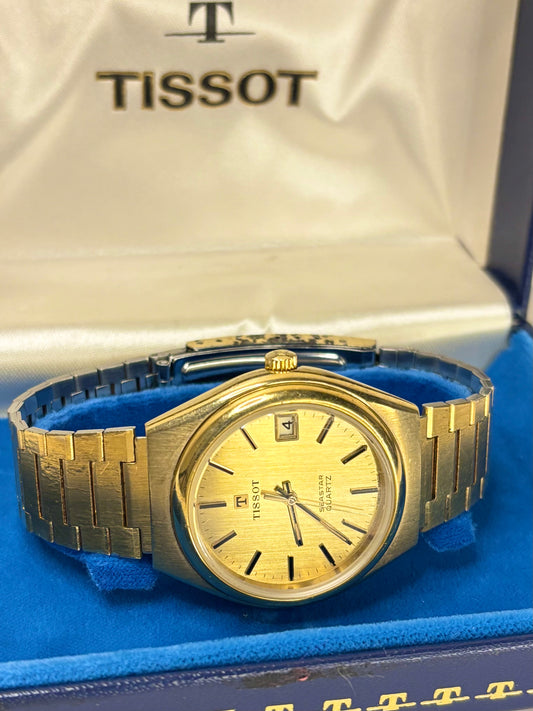 Vintage c.1974 Tissot quartz timepiece – men's gold-plated dress watch in good condition with age-appropriate marks, complete with original box