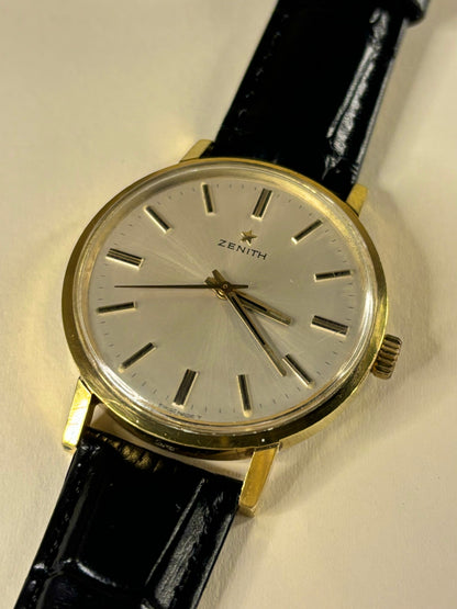 Vintage Zenith 1968 men’s gold plated dress timekeeper showcasing elegant Swiss design with sunburst dial