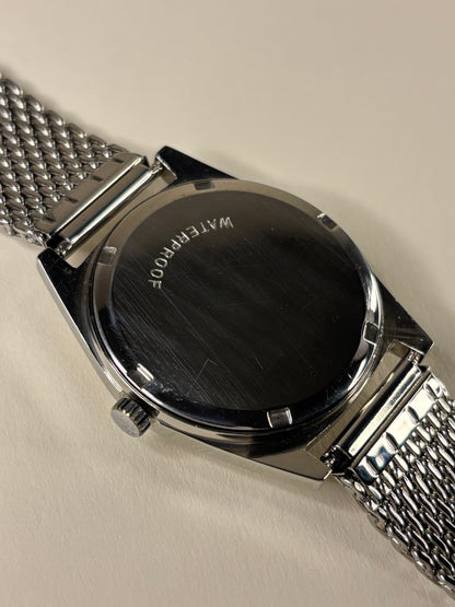 Omega Genève Ref. 135.041 stainless steel 1970 men’s dress timekeeper caseback view with hallmark details