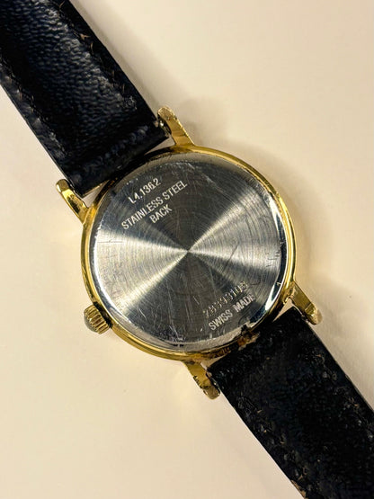 Caseback of Longines vintage 1983 ladies’ quartz gold plated wristwatch