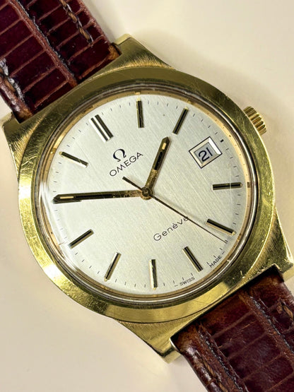 Premium luxury vintage Omega Genève men’s timepiece featuring a gold-plated case and classic dial, a refined handmade Swiss timekeeper