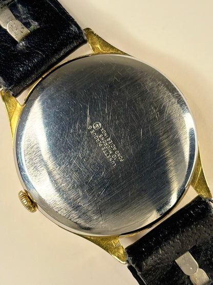 Services Windsor 1961 gold plated men’s vintage dress timekeeper caseback view with hallmark details