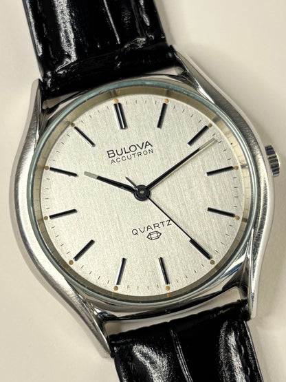 Close up of Bulova Accutron 1977 silver dial vintage men’s watch