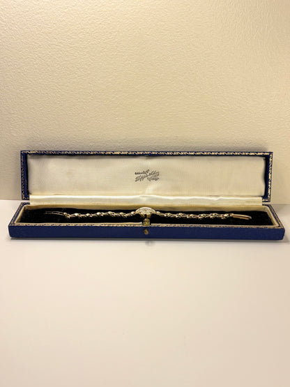 Avia 1966 solid gold ladies vintage timekeeper caseback view with hallmark details and presentation box