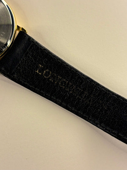 leather strap of Longines Presence vintage 1992 men’s quartz gold plated wristwatch