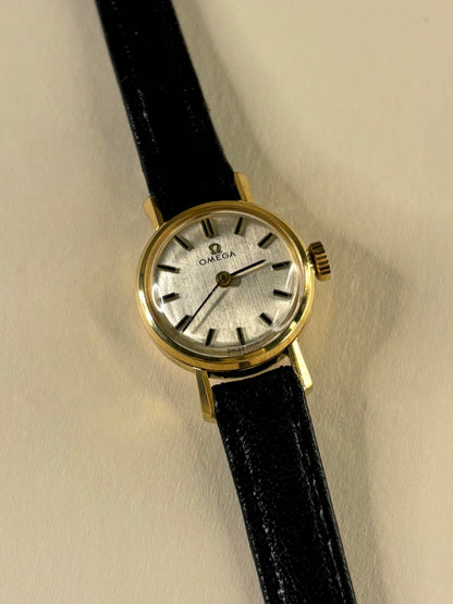 Collectible Omega ladies Ref. 511.073 1963 vintage timekeeper featuring white dial and gold plated finish