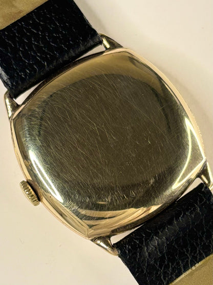 Vintage Sackville cushion timepiece 1945 — manual wind timekeeper with rolled gold 30mm case, crown and caseback detail