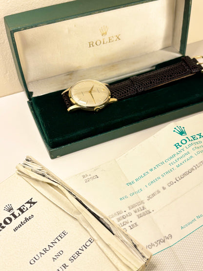Detailed image of the 18ct Rolex Precision dress timepiece, with it's original box and papers