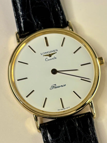 Close up of Longines Presence 1991 men’s watch gold dial solid 9ct case quartz