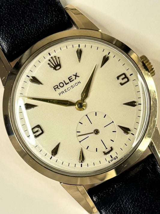 Rolex Precision vintage men’s dress watch ref. 1200 with 9ct solid gold case and classic dial, c.1954