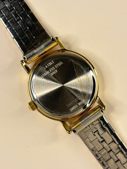 Caseback of Longines vintage 1999 ladies’ quartz gold plated wristwatch