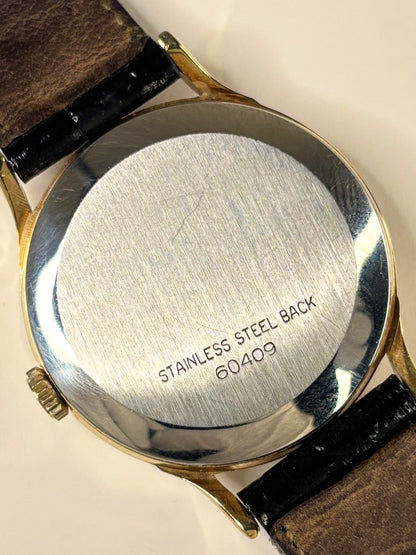 Rotary Ref. 1967 gold plated 1967 men’s vintage dress timekeeper caseback view with hallmark details