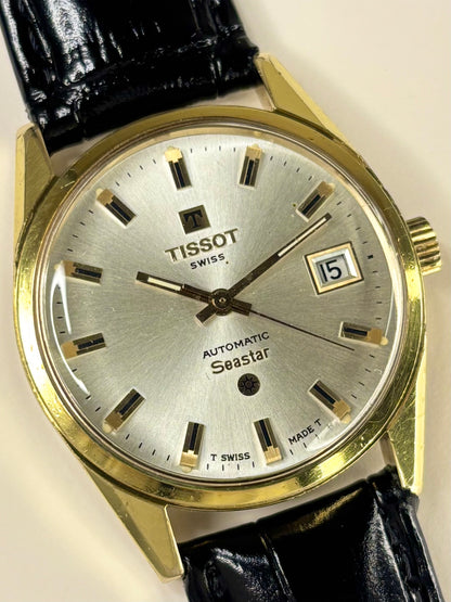 Collectible Tissot Seastar Ref. 44543 men’s vintage timekeeper featuring white sunburst dial and Swiss craftsmanship