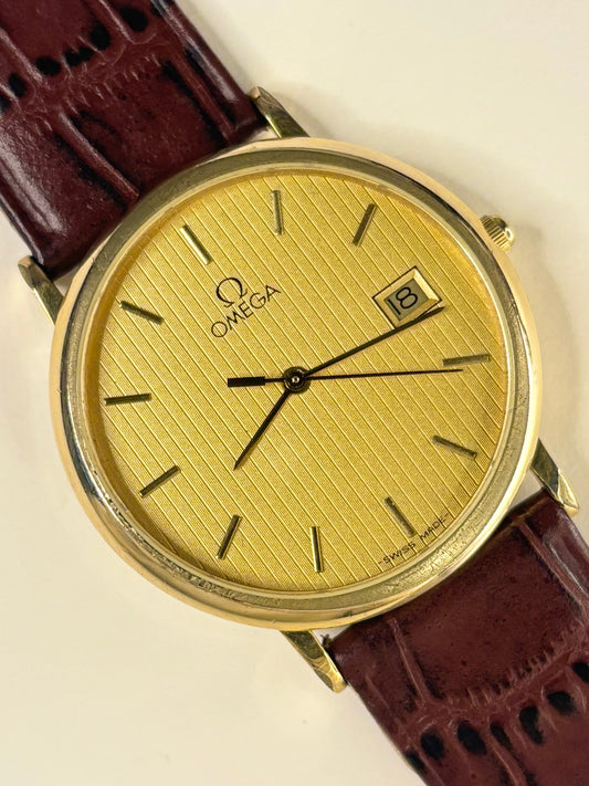 Vintage c.1983 Omega De Ville ref. 196.0312 quartz timepiece – men's gold-plated dress watch with gold-toned dial, in great condition with only minor age-appropriate marks.