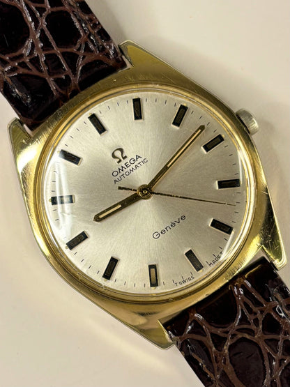Omega Genève 1967 men’s dress timekeeper with gold plated case, white sunburst dial and automatic movement